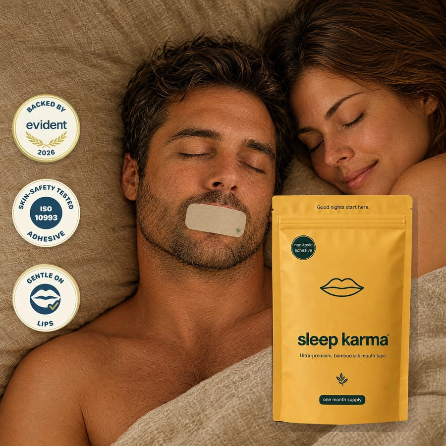 Man wearing Sleep Karma mouth tape asleep beside his partner