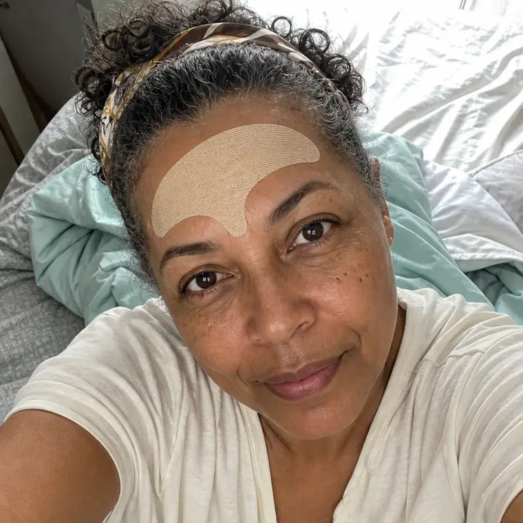Dionne, lying in bed